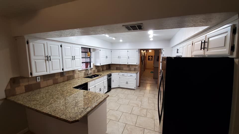 Cabinet Painting: Costs, Tips, and Trends for Ardmore Homes 2 This kitchen, with its dated oak cabinets and laminate countertops, is the perfect "before" picture for a cabinet painting project.