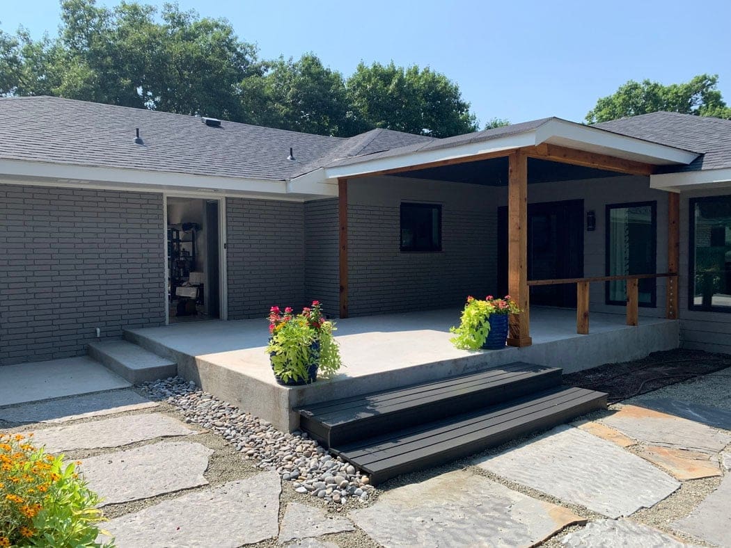 Completed exterior brick painting project on residential home by Derheim Painting