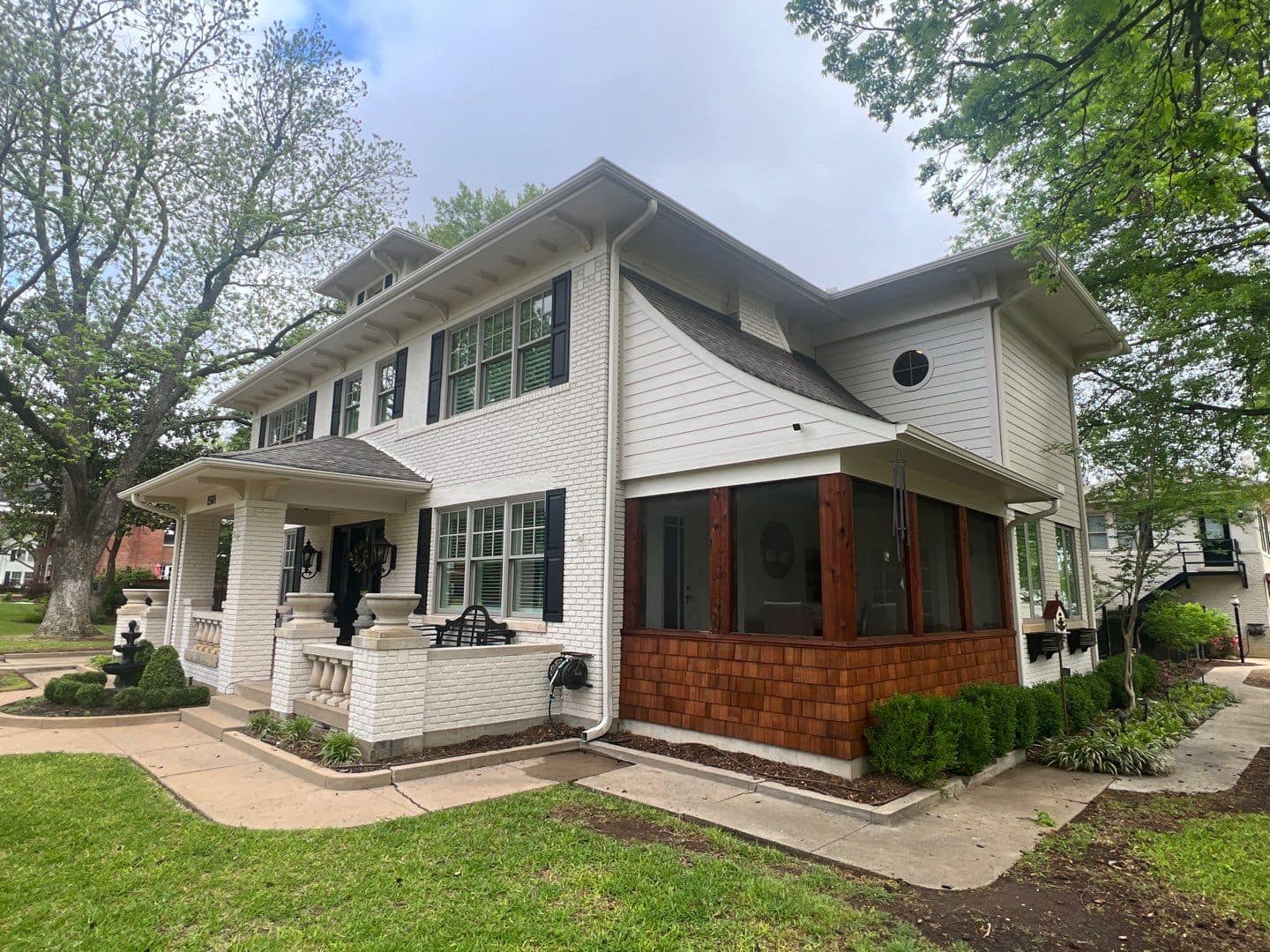 Completed exterior painting on a historic two-story home in Ardmore, OK