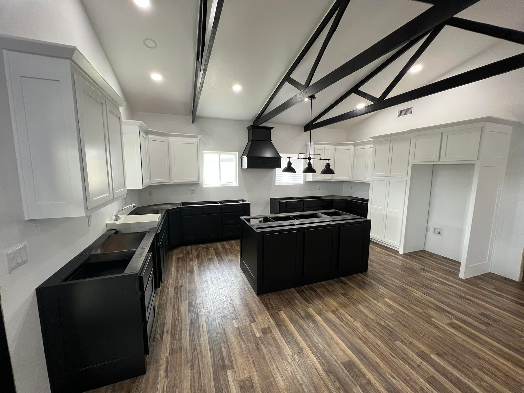 Derheim Painting two-tone black and white cabinet painting in Ardmore, OK