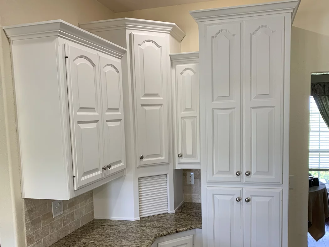 Derheim Painting white upper cabinet and pantry painting project in Ardmore, OK